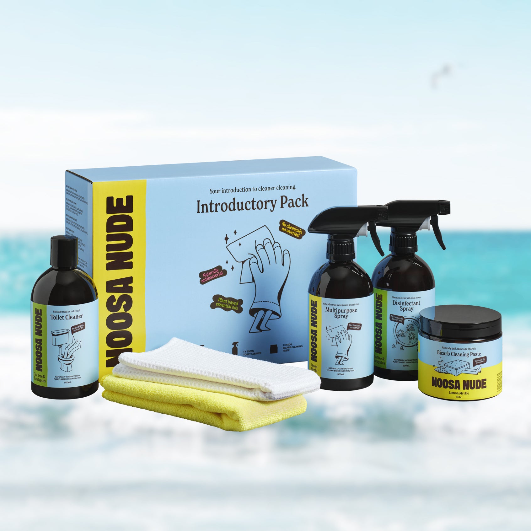 Noosa Nude cleaning product set with packaging on a light blue background